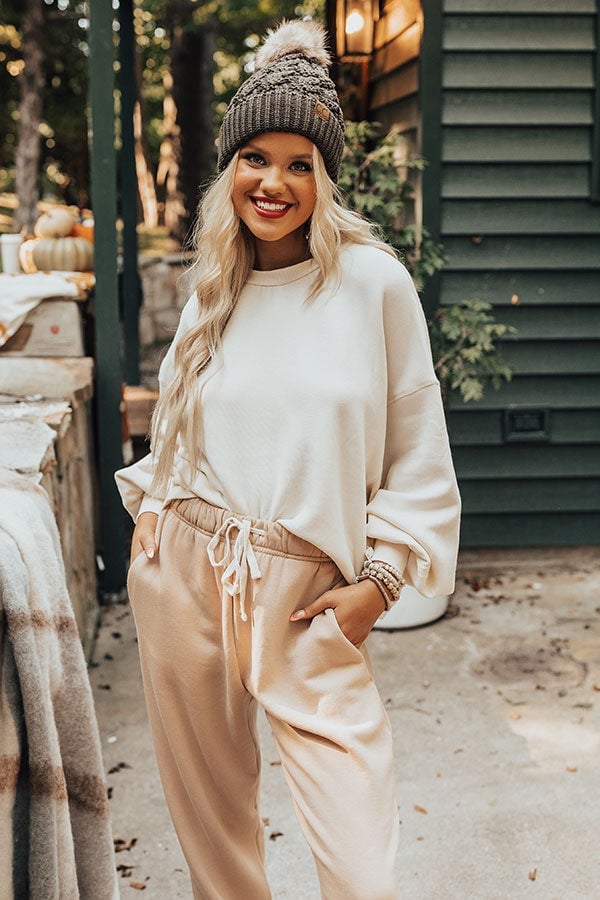Beige Joggers With Cream Sweatshirt Beanie and Bracelets, Relaxed Fit Beige Joggers With Cream Sweatshirt Beanie and Bracelets, Relaxed Fit — Cream Joggers Outfits 2027