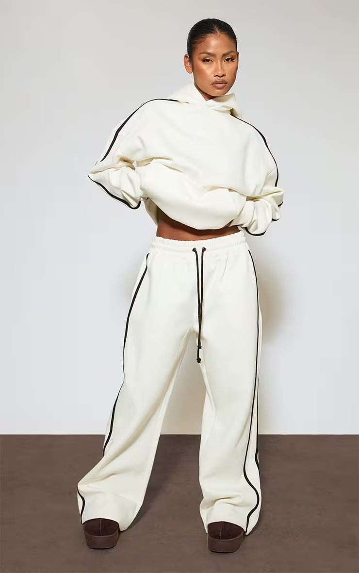 Cream Joggers With Black Stripes Hoodie and Platform, Close-Up Take Cream Joggers With Black Stripes Hoodie and Platform, Close-Up Take — Cream Joggers Outfits 2027