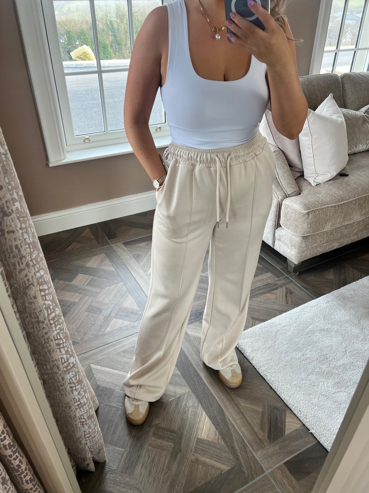Cream Wide Leg Joggers With Tank Top Espadrilles, Close-Up Take Cream Wide Leg Joggers With Tank Top Espadrilles, Close-Up Take — Cream Joggers Outfits 2027