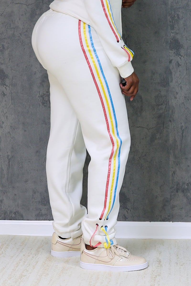 Cream Cotton Knit Joggers With Colorful Stripes and Sneakers Cream Cotton Knit Joggers With Colorful Stripes and Sneakers — Cream Joggers Outfits 2027