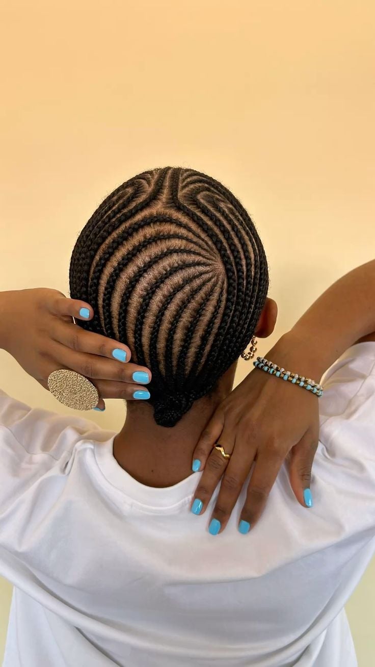 Swirling Cornrow Bun Swirling Cornrow Bun — Curved Cornrows 2027