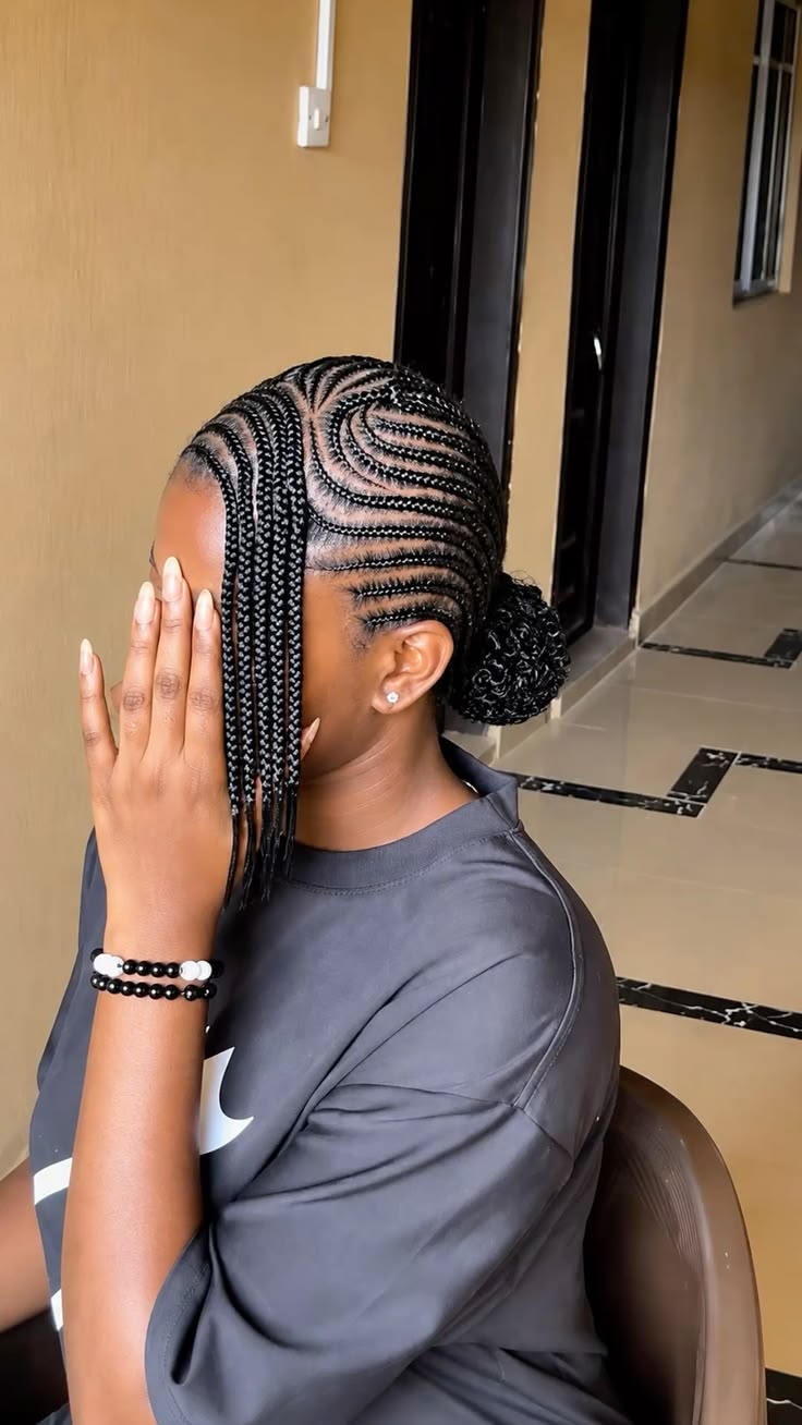 Curved Cornrows Updo With Face-Framing Curls Curved Cornrows Updo With Face-Framing Curls — Curved Cornrows 2027
