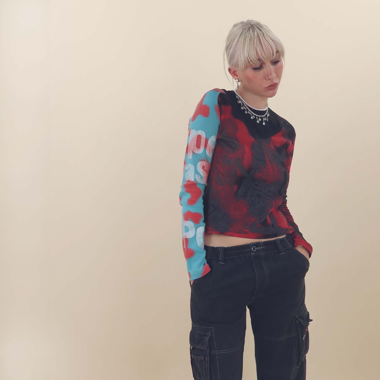 Graphic print long sleeve top with loose cargo pants Graphic print long sleeve top with loose cargo pants — Cyber Y2K Outfits 2027