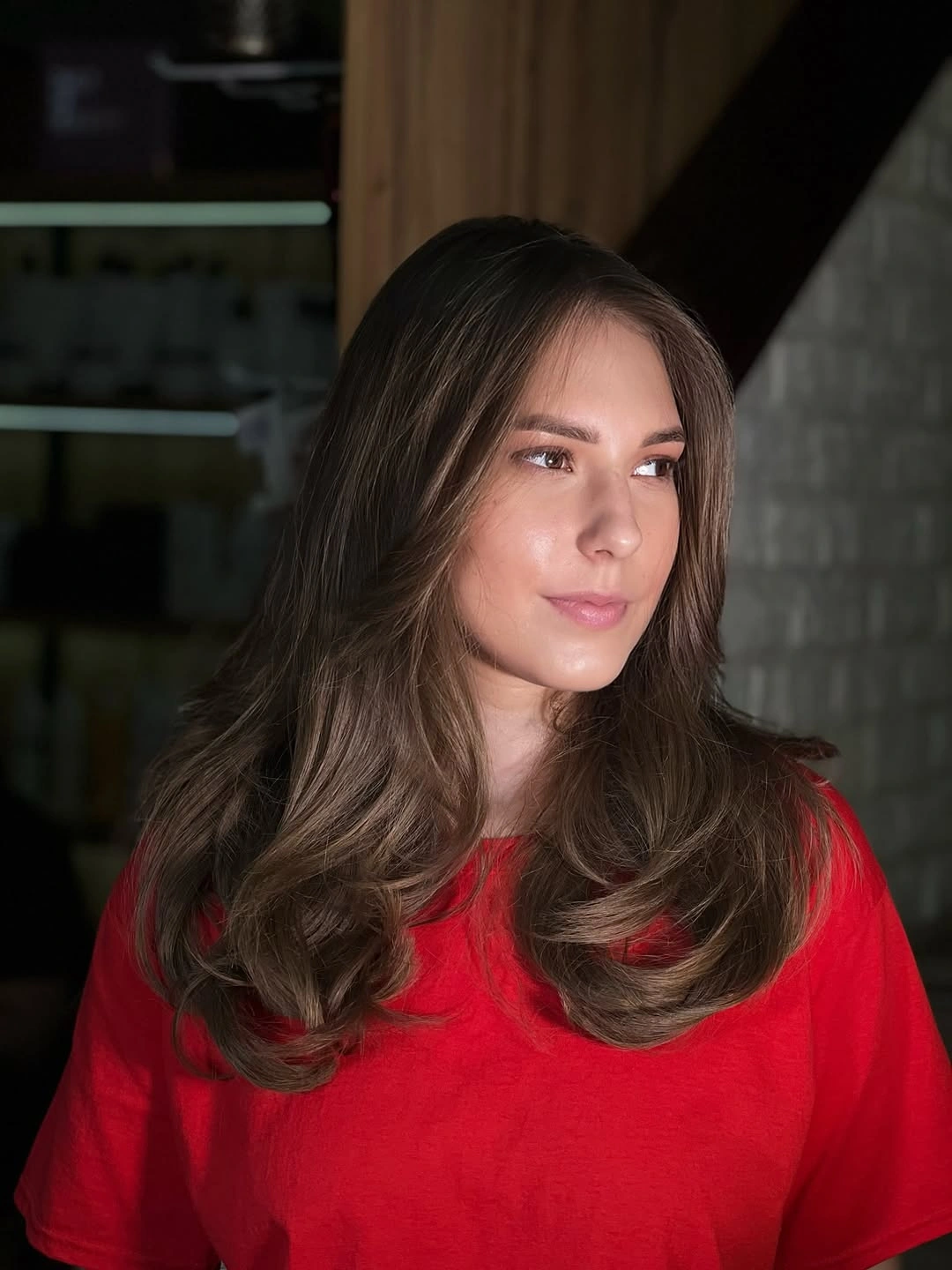 Rounded Brunette Layers Keep the Silhouette Soft Medium-long brunette hair with rounded layers and face framing