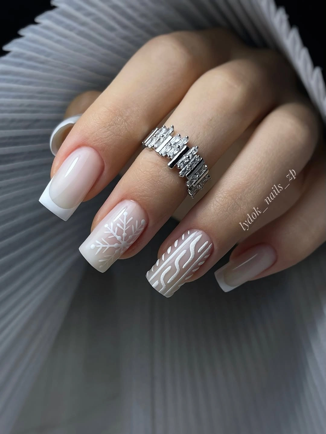 White French Tips With Soft Winter Texture Square blush nails with white French tips, snowflake, and textured linework
