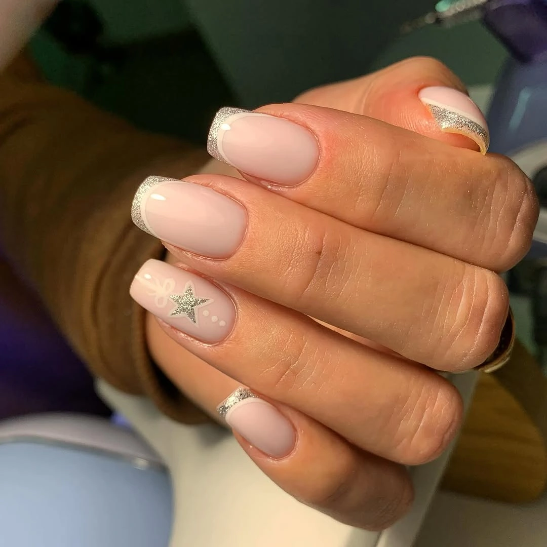 Silver Micro-French Nails With a Delicate Star Accent Blush square nails with silver glitter tips and star accent