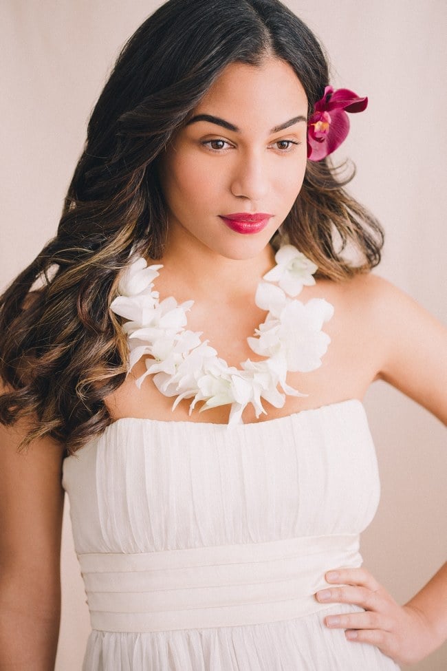 Dark Brown Loose Waves With Flower Dark Brown Loose Waves With Flower — Destination Wedding Hairstyles 2027