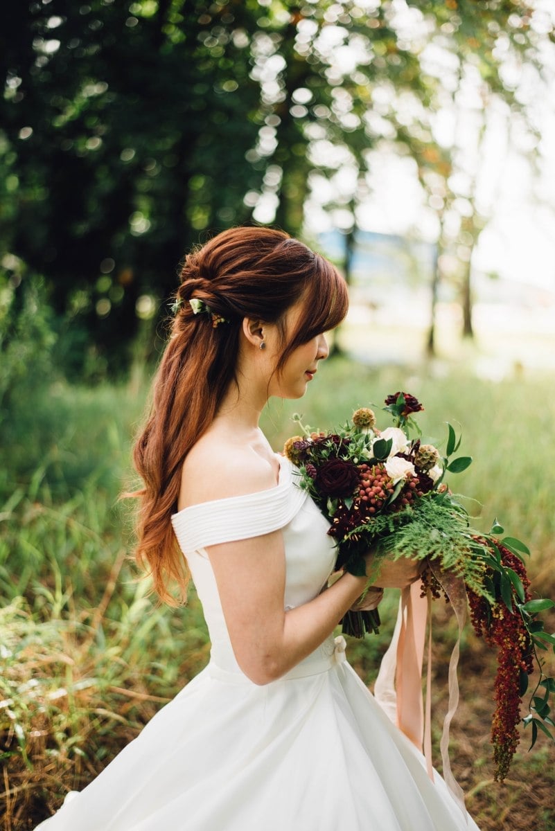 Reddish-Brown Loose Braid With Flowers Reddish-Brown Loose Braid With Flowers — Destination Wedding Hairstyles 2027