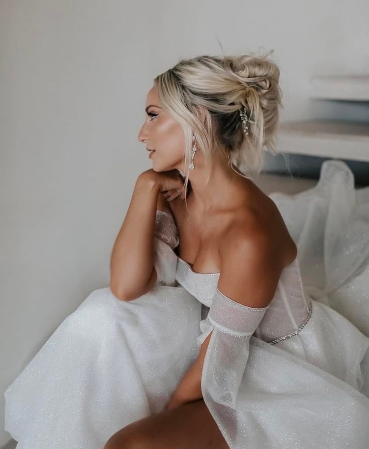 Ash Blonde Messy Bun With Wisps Ash Blonde Messy Bun With Wisps — Destination Wedding Hairstyles 2027