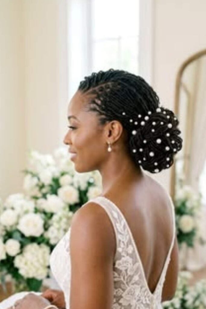Black Coily Locs Updo With Pearls Black Coily Locs Updo With Pearls — Destination Wedding Hairstyles 2027