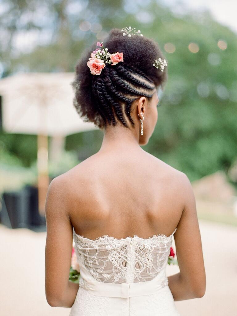 Black Coily Braided Updo With Flowers, Shoulder Black Coily Braided Updo With Flowers, Shoulder — Destination Wedding Hairstyles 2027