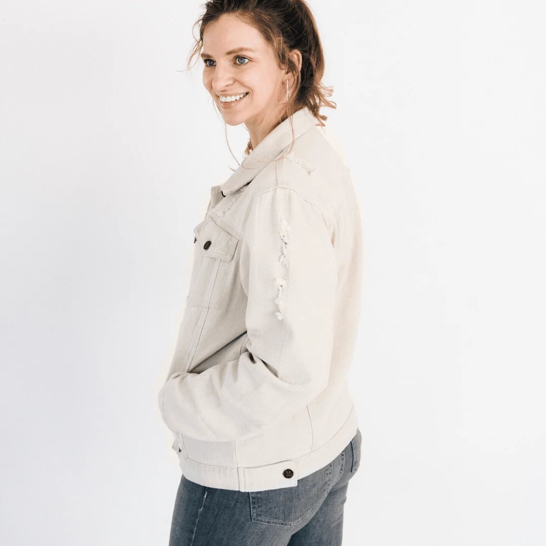 Beige Distressed Denim Jacket With Flared Jeans Beige Distressed Denim Jacket With Flared Jeans — Distressed Denim Jacket Outfits 2027