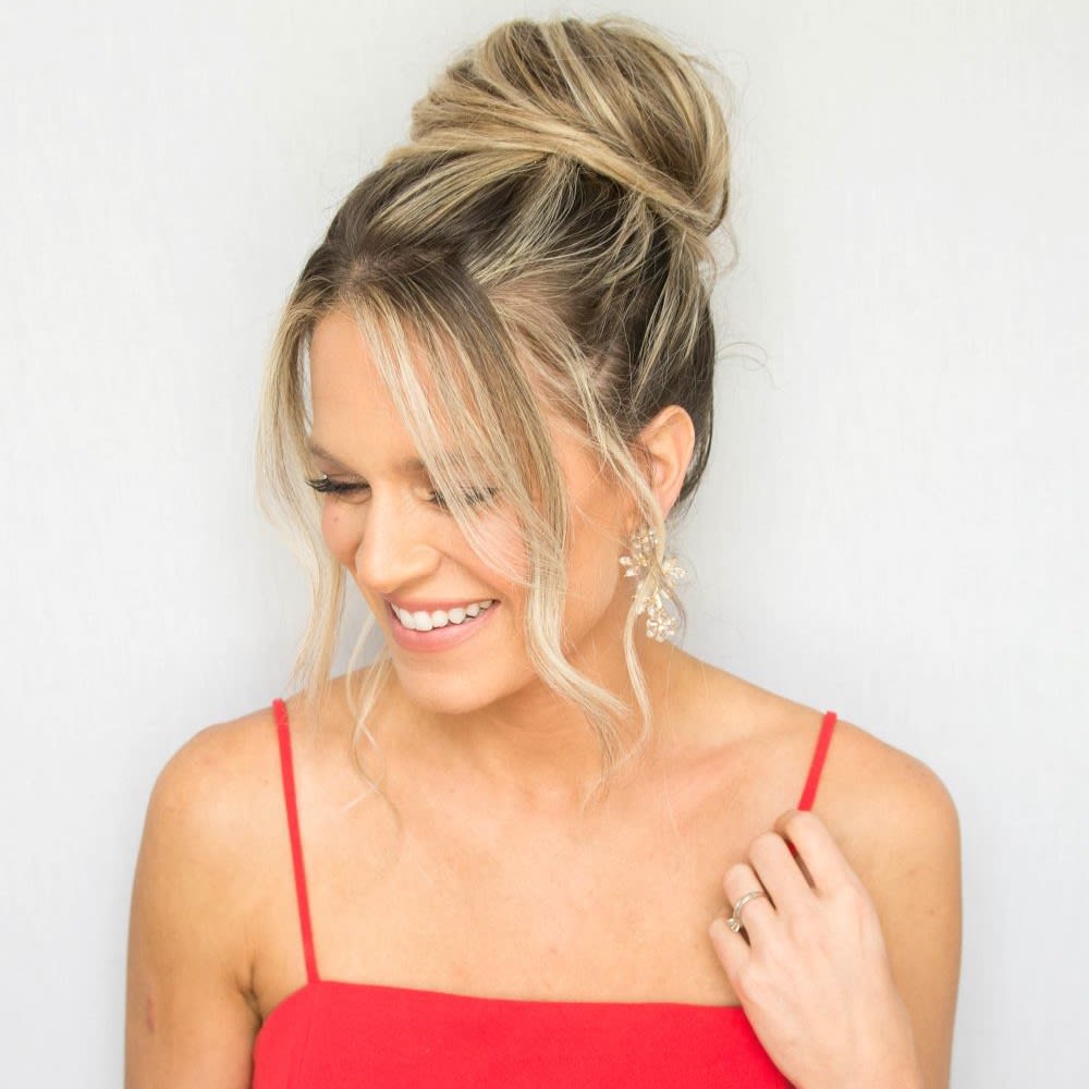 Messy Blonde Bun With Loose Tendrils Messy Blonde Bun With Loose Tendrils — Donut Bun Hairstyles 2027