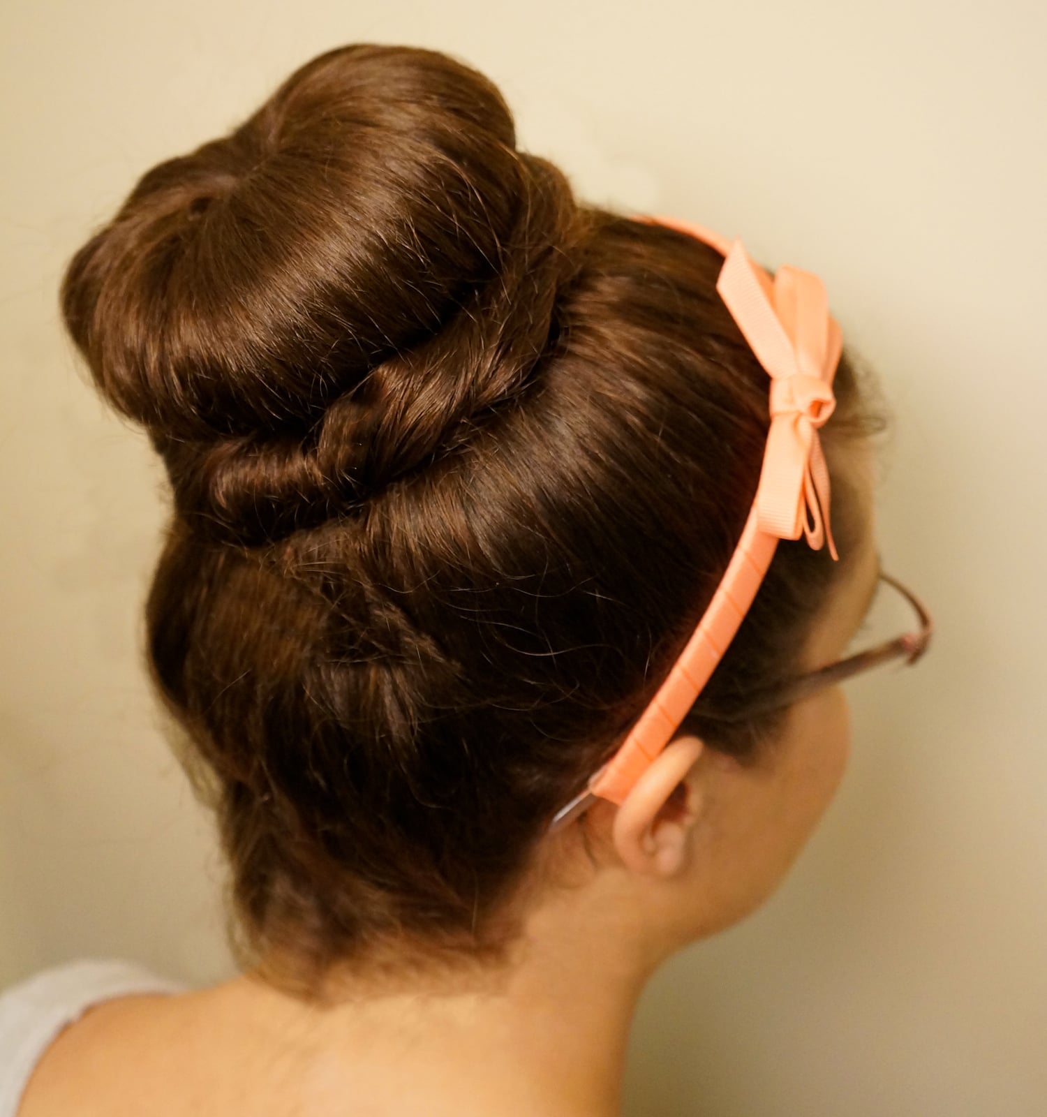 Polished Collarbone Length Dark Brown Donut Bun Polished Collarbone Length Dark Brown Donut Bun — Donut Bun Hairstyles 2027