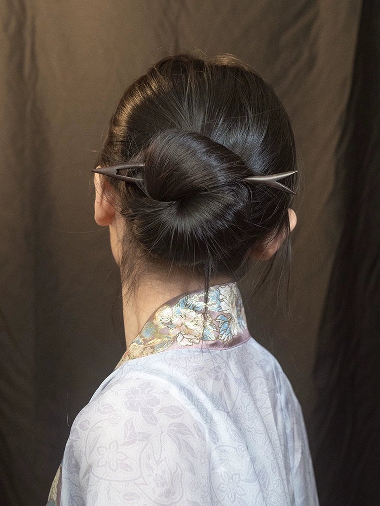 Dark Brown Low Bun With Hair Stick Dark Brown Low Bun With Hair Stick — Donut Bun Hairstyles 2027