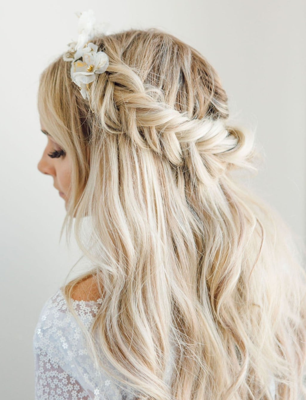 Mid-Back Blonde Braided Updo With Flowers, Face Framing Mid-Back Blonde Braided Updo With Flowers, Face Framing — Down Bachelorette Hairstyles 2027