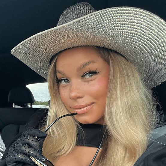 Collarbone Light Blonde Loose Waves, Wispy Bangs Collarbone Light Blonde Loose Waves, Wispy Bangs — Down Country Concert Hairstyles 2027