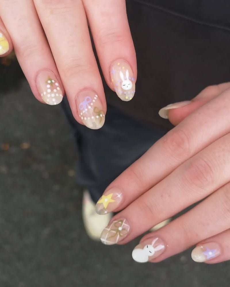 Short Oval Nails with White Bunny Illustrations Short Oval Nails with White Bunny Illustrations — Easter Egg Nails 2027