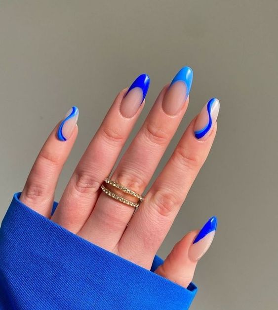 Modern Electric Blue French Tip Medium Almond Nails Modern Electric Blue French Tip Medium Almond Nails — Electric Blue Nails 2027