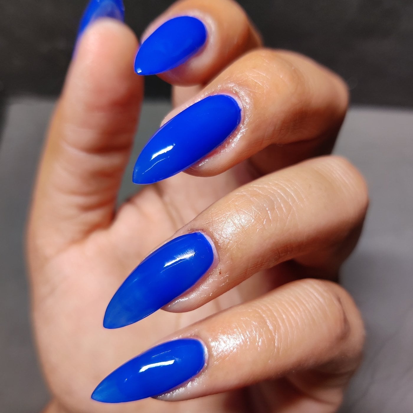 Vivid Glossy Electric Blue Long Stiletto Nails Vivid Glossy Electric Blue Long Stiletto Nails — Electric Blue Nails 2027