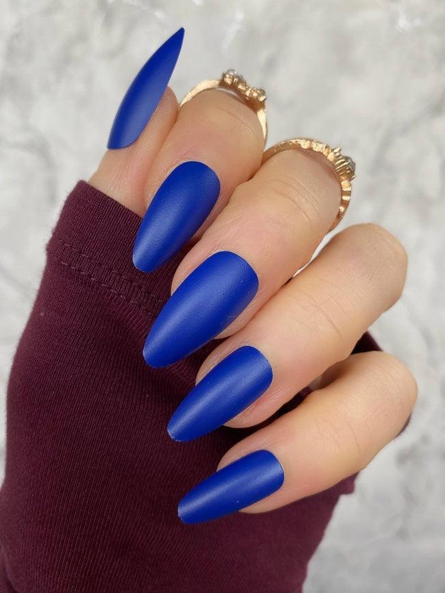 Vivid Matte Electric Blue Long Stiletto Nails, Close-Up Take Vivid Matte Electric Blue Long Stiletto Nails, Close-Up Take — Electric Blue Nails 2027