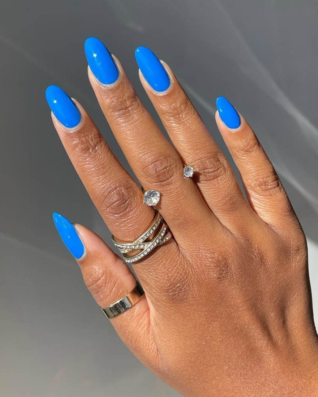 Vivid Glossy Electric Blue Long Almond Nails, Everyday Version Vivid Glossy Electric Blue Long Almond Nails, Everyday Version — Electric Blue Nails 2027