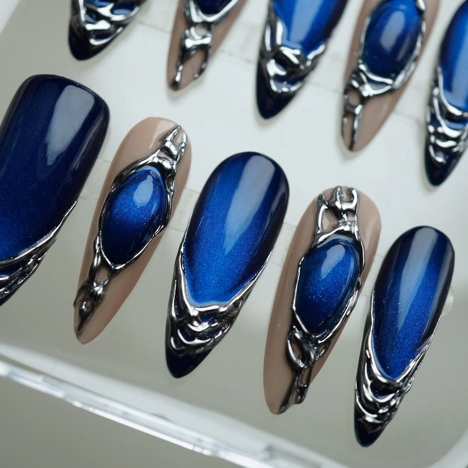 Deep Blue Cat Eye Chrome Medium Stiletto Nails Deep Blue Cat Eye Chrome Medium Stiletto Nails — Electric Blue Nails 2027