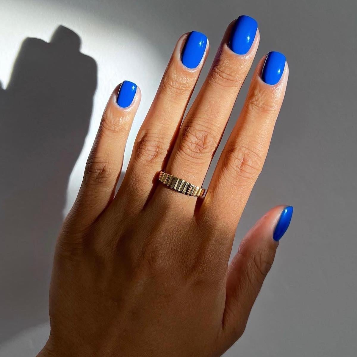Vivid Glossy Electric Blue Short Square Nails Vivid Glossy Electric Blue Short Square Nails — Electric Blue Nails 2027