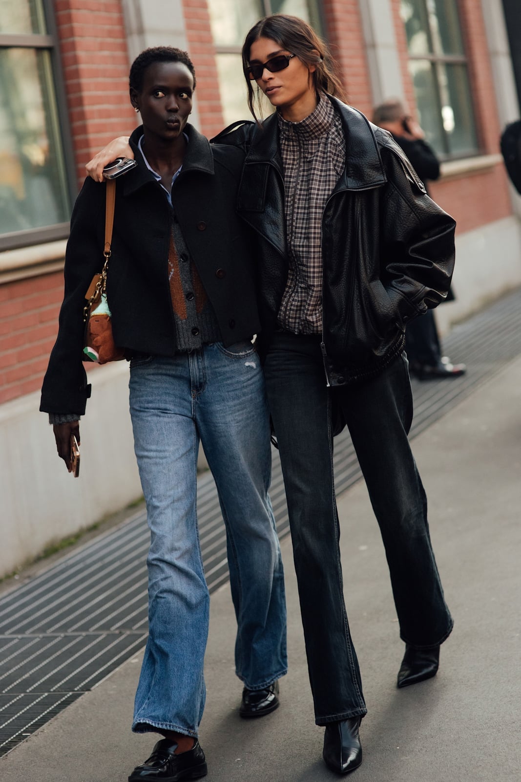 Black leather jacket with plaid shirt and straight-leg jeans Black leather jacket with plaid shirt and straight-leg jeans — Fall Bomber Jacket Outfits 2026