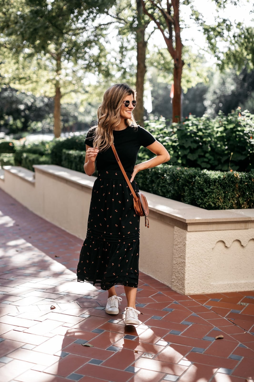 Black tiered floral maxi skirt with white t-shirt, Brown Crossbody Bag Black tiered floral maxi skirt with white t-shirt, Brown Crossbody Bag — Floral Skirt Outfits 2027
