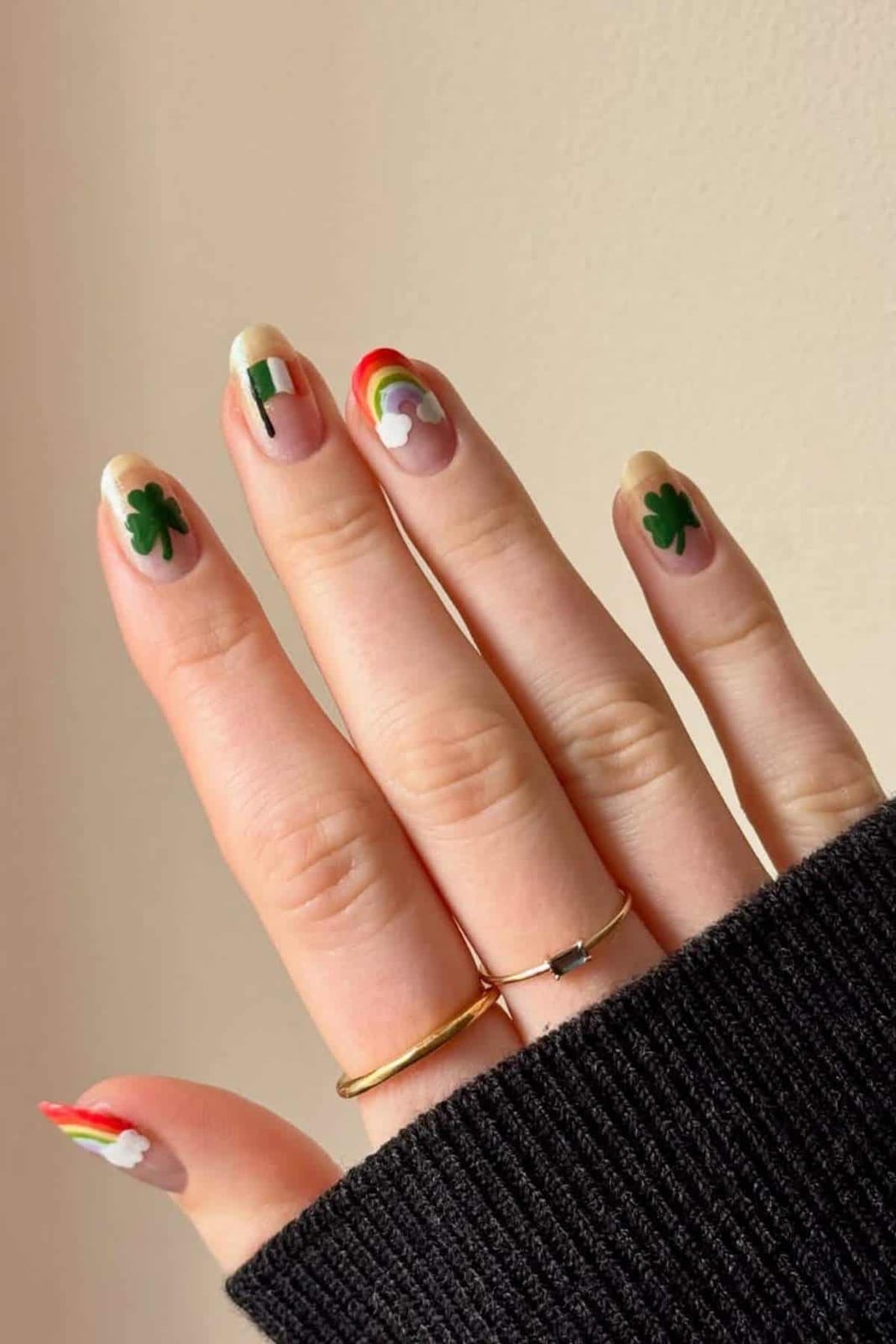 Medium Almond With Nude Base And Mixed Motifs Medium Almond With Nude Base And Mixed Motifs — Four Leaf Clover Nails 2027