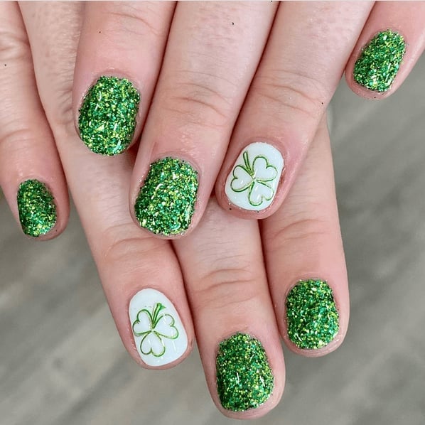 Short Almond Green Glitter With Outline Clovers Short Almond Green Glitter With Outline Clovers — Four Leaf Clover Nails 2027