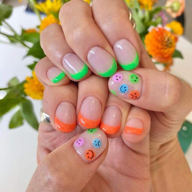 Short Oval Neon French Tips With Colorful Smileys Short Oval Neon French Tips With Colorful Smileys — French Smiley Face Nails 2027
