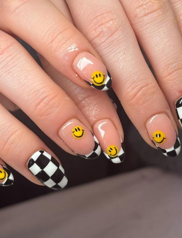 Medium Almond Checkerboard French Tips With Smileys Medium Almond Checkerboard French Tips With Smileys — French Smiley Face Nails 2027