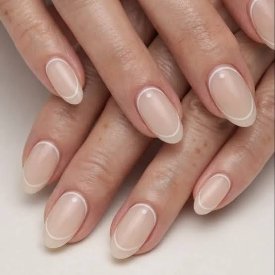 Minimalist White Outline Medium Oval French Nails Minimalist White Outline Medium Oval French Nails — French Tip Nails 2027 for Chubby Fingers