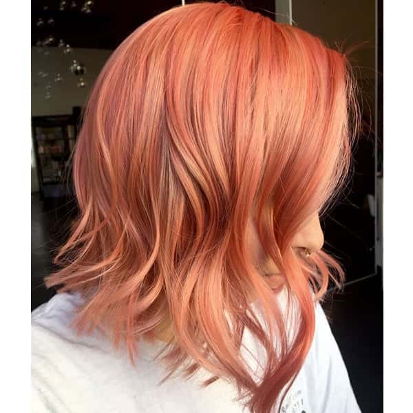 Collarbone Lob With Vibrant Peachy Pastel Collarbone Lob With Vibrant Peachy Pastel — Fun Hair Color Pastel 2027