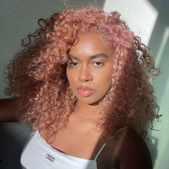 Collarbone Cut With Pastel Rose Gold Curls Collarbone Cut With Pastel Rose Gold Curls — Fun Hair Color Pastel 2027