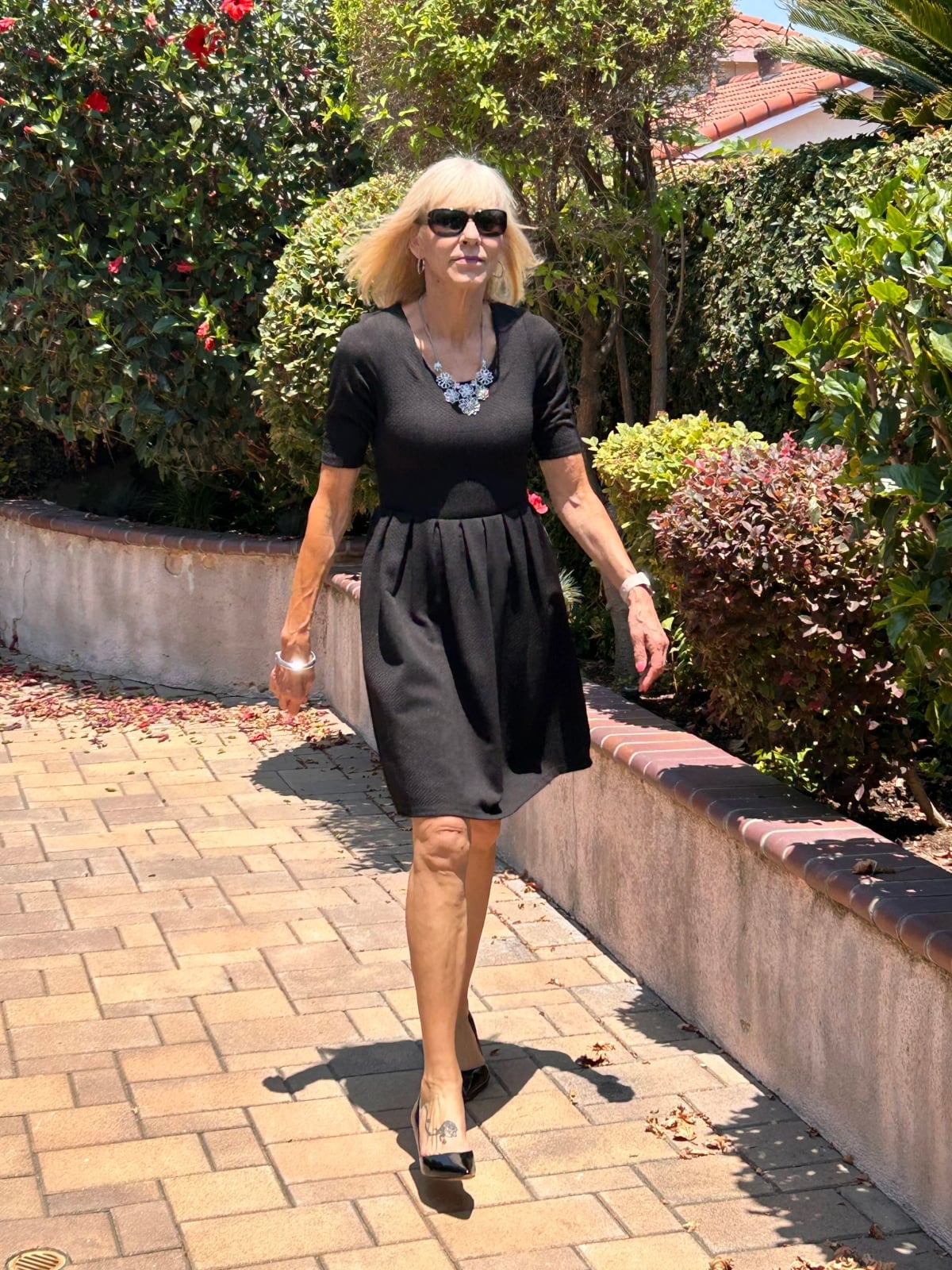 Black Textured Dress with Pleated Skirt Black Textured Dress with Pleated Skirt — Funeral Dresses 2027