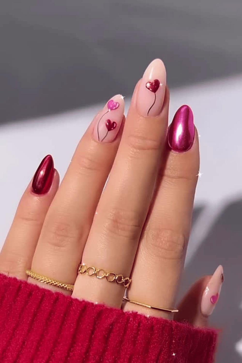 Long Almond Nails with Hearts and Metallic Pink Accents Long Almond Nails with Hearts and Metallic Pink Accents — Galentines Nails 2027