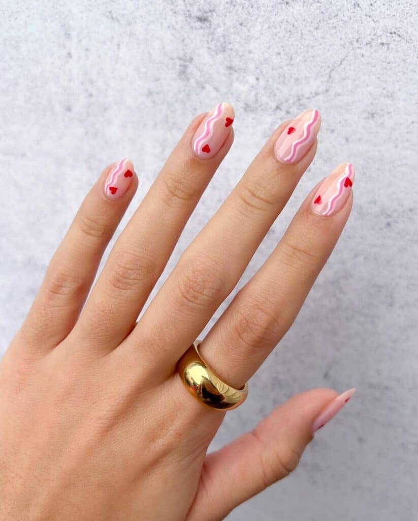 Medium Almond Nails with Wavy Pink Lines and Hearts Medium Almond Nails with Wavy Pink Lines and Hearts — Galentines Nails 2027