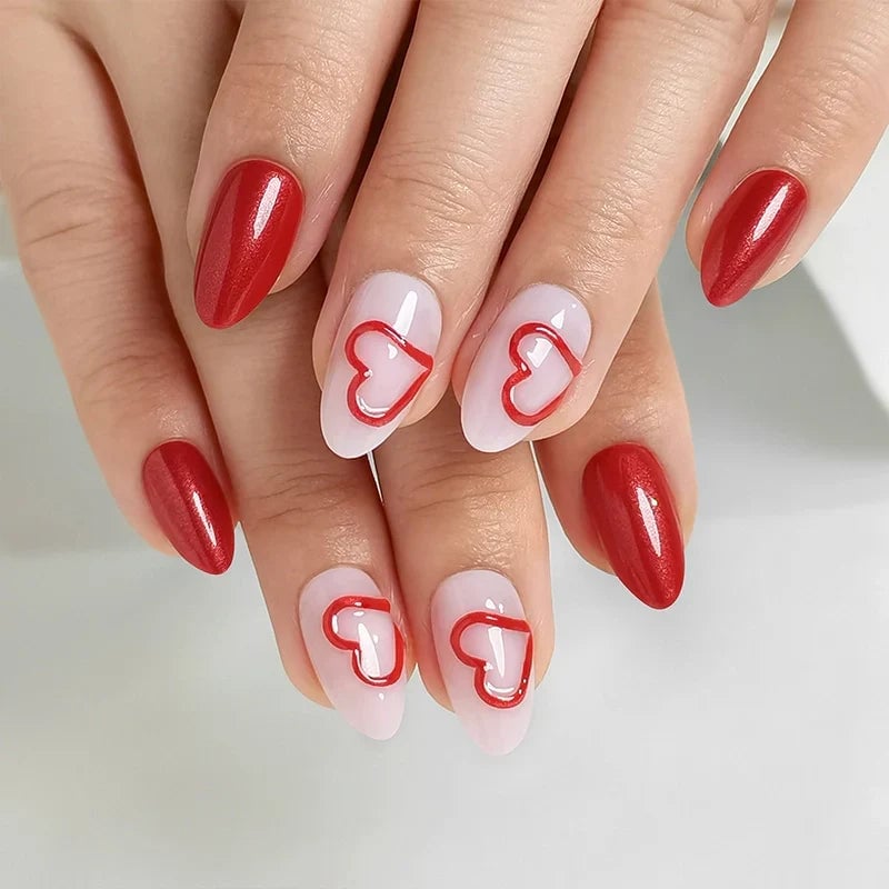 Medium Oval Nails with Mixed Red Heart Designs Medium Oval Nails with Mixed Red Heart Designs — Galentines Nails 2027