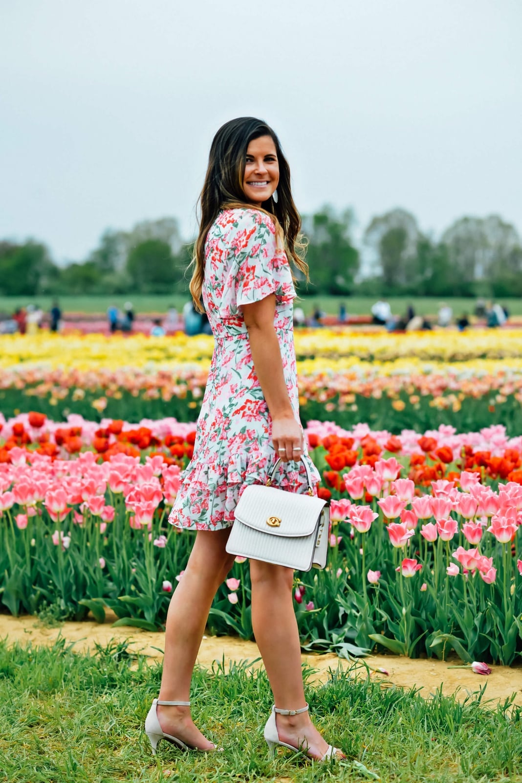 White short wrap dress with vibrant floral print and ruffle hem White short wrap dress with vibrant floral print and ruffle hem — Garden Party Dresses 2027