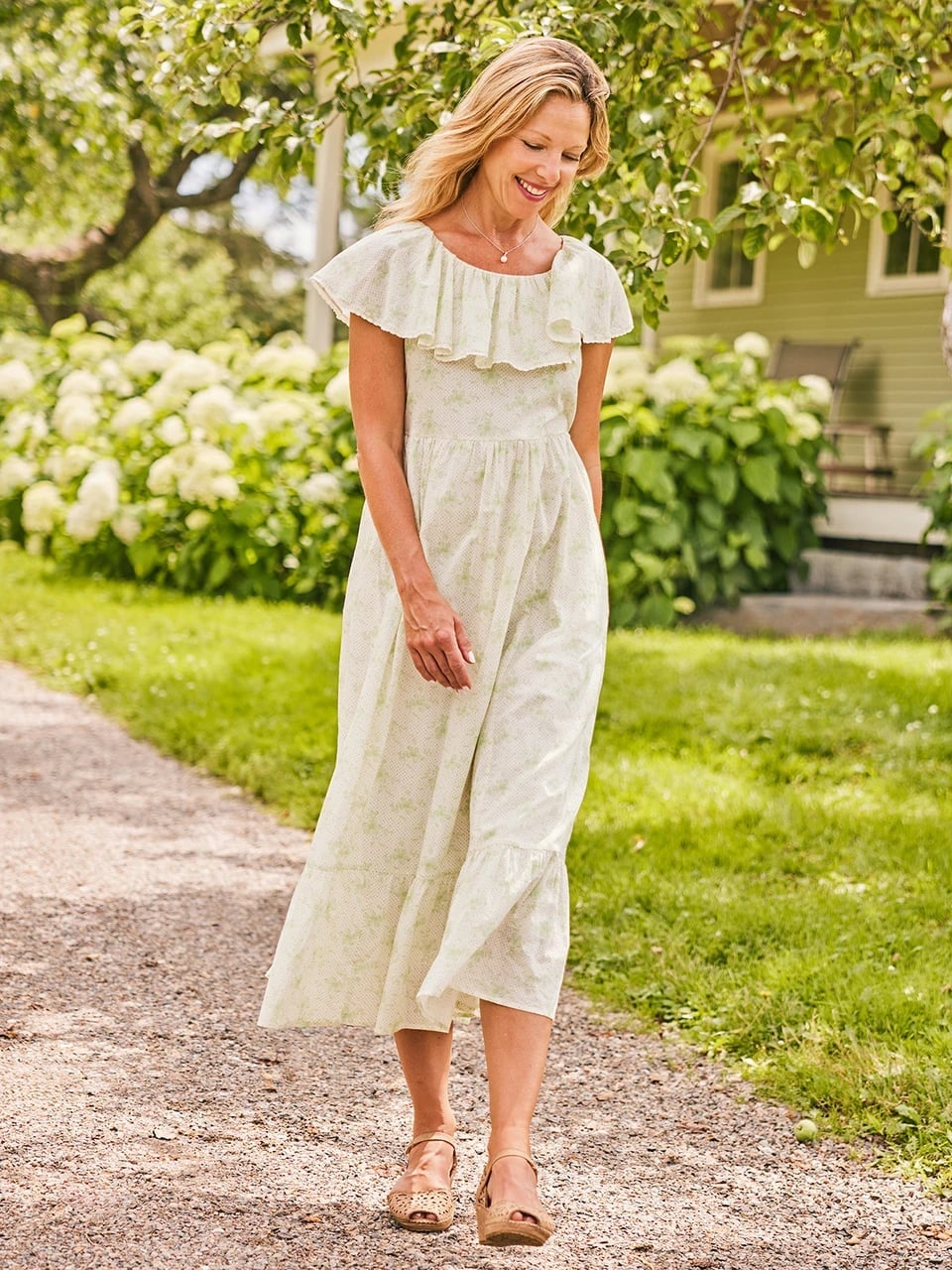 White cotton maxi dress with green floral print and ruffled neckline White cotton maxi dress with green floral print and ruffled neckline — Garden Party Dresses 2027