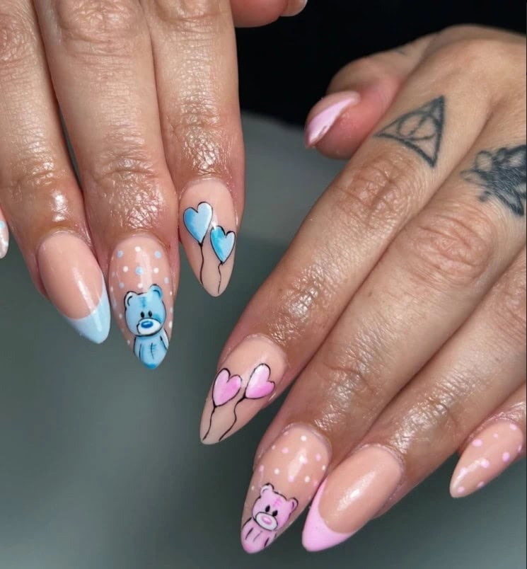 Medium Almond Nails with Gold Swirls and Hearts, Close-Up Take — Gender Reveal Nails 2027