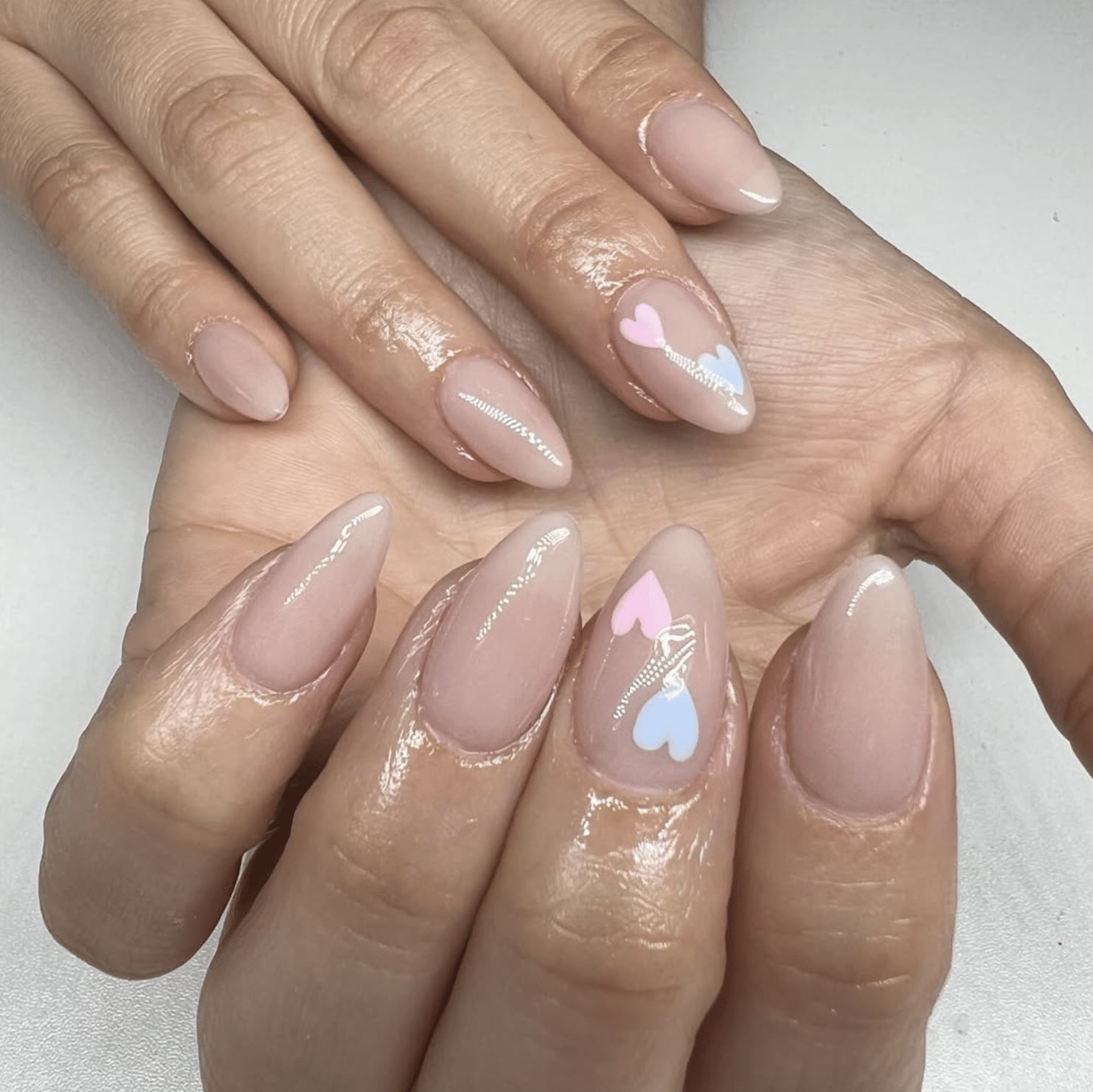 Medium Stiletto Nails with Delicate Pink and Blue Hearts — Gender Reveal Nails 2027