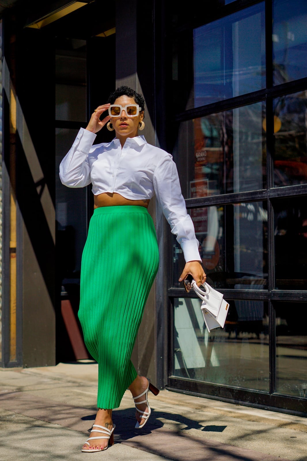White cropped shirt with green pleated midi skirt — Girls Night Out Outfits 2027