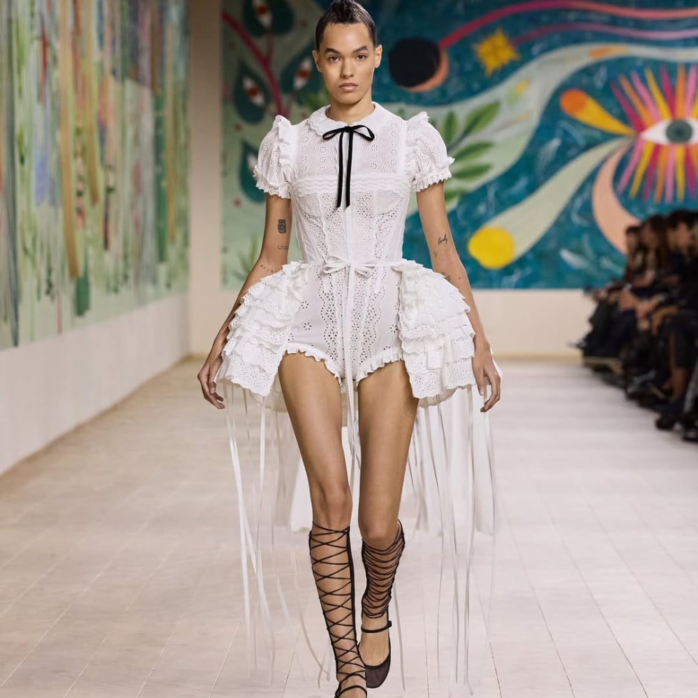 Black gladiators with a white broderie anglaise romper Black gladiators with a white broderie anglaise romper — Gladiator Sandals Outfits 2027