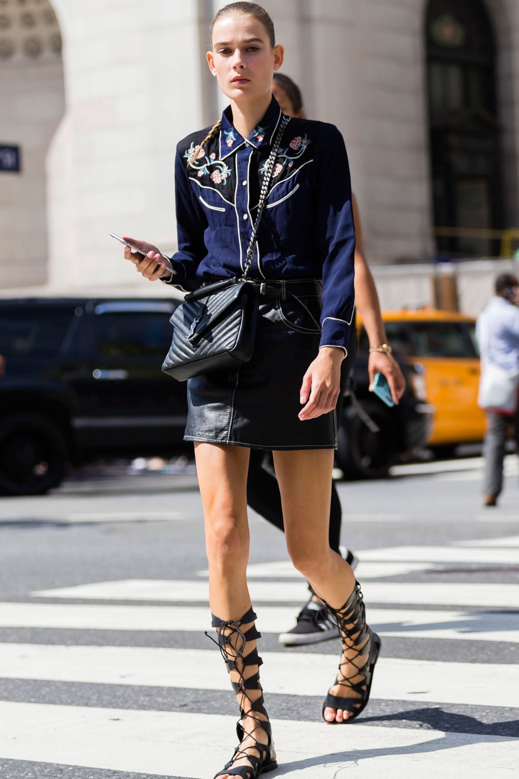 Black gladiators with a western shirt and leather mini skirt Black gladiators with a western shirt and leather mini skirt — Gladiator Sandals Outfits 2027