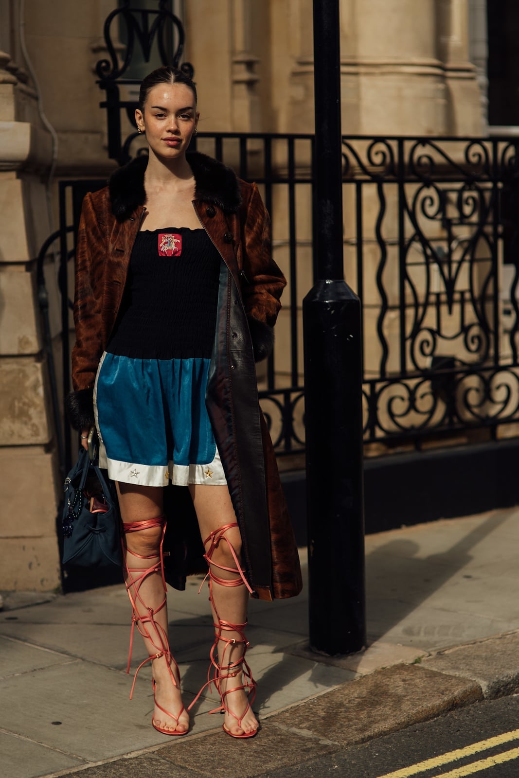 Pink gladiators with satin shorts and a fur-trim coat Pink gladiators with satin shorts and a fur-trim coat — Gladiator Sandals Outfits 2027