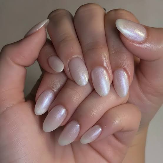 Medium Almond Milky White Pearlescent Glazed Nails, Close-Up Take Medium Almond Milky White Pearlescent Glazed Nails, Close-Up Take — Glazed Donut Nails 2027